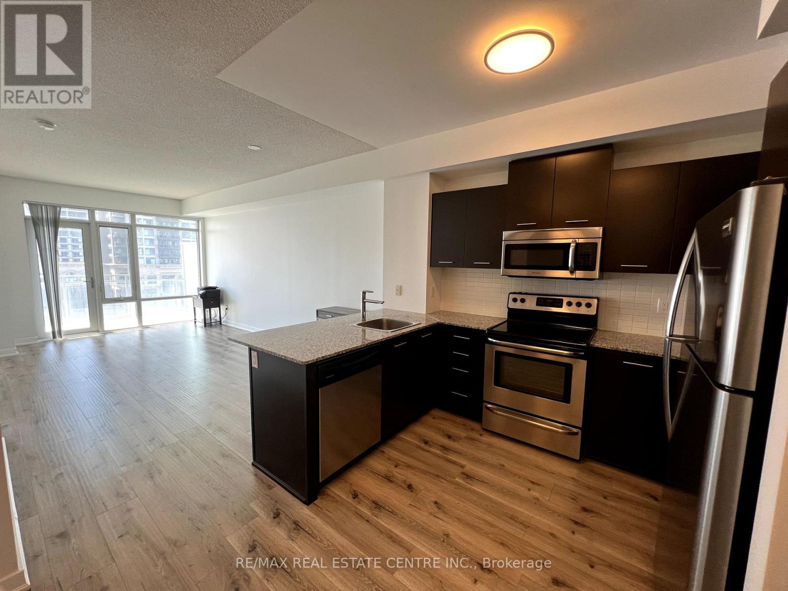 1006 - 365 Prince Of Wales Drive, Mississauga, Ontario  L5B 0G6 - Photo 2 - W12411424