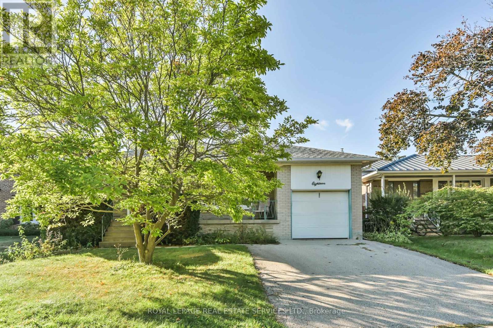 18 Torrington Drive, Toronto, Ontario  M9C 3V5 - Photo 2 - W12412122