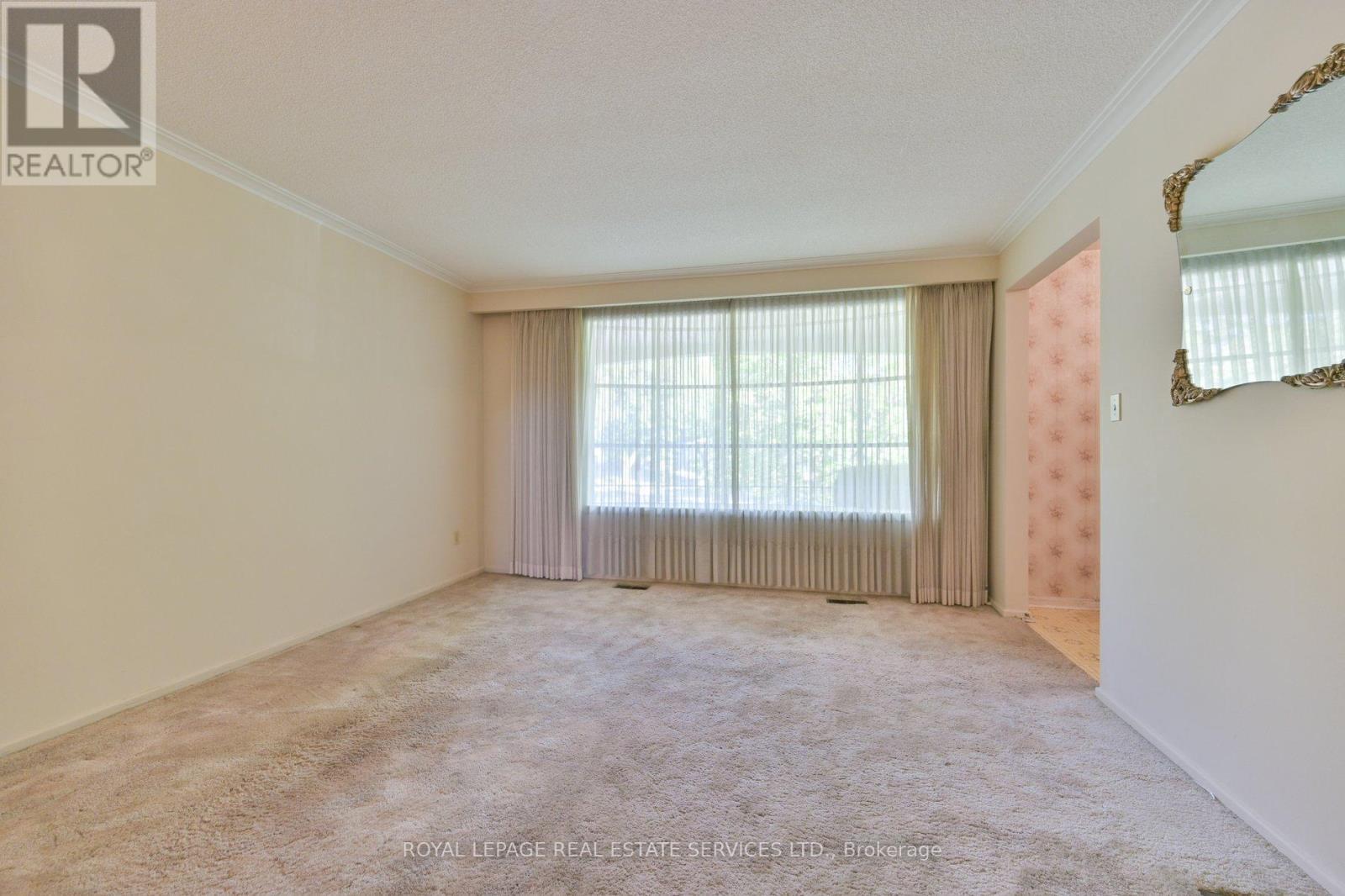18 Torrington Drive, Toronto, Ontario  M9C 3V5 - Photo 7 - W12412122