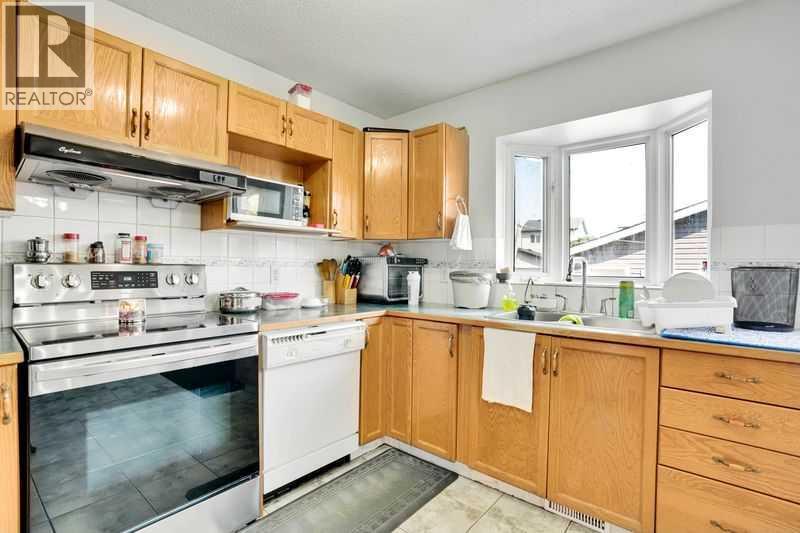 8 Martin Crossing Crescent Ne, Calgary, Alberta  T3J 3P3 - Photo 25 - A2257065