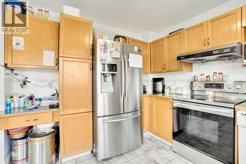 8 Martin Crossing Crescent Ne, Calgary, Alberta  T3J 3P3 - Photo 28 - A2257065
