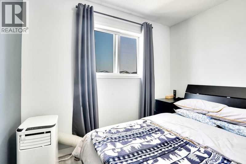8 Martin Crossing Crescent Ne, Calgary, Alberta  T3J 3P3 - Photo 29 - A2257065