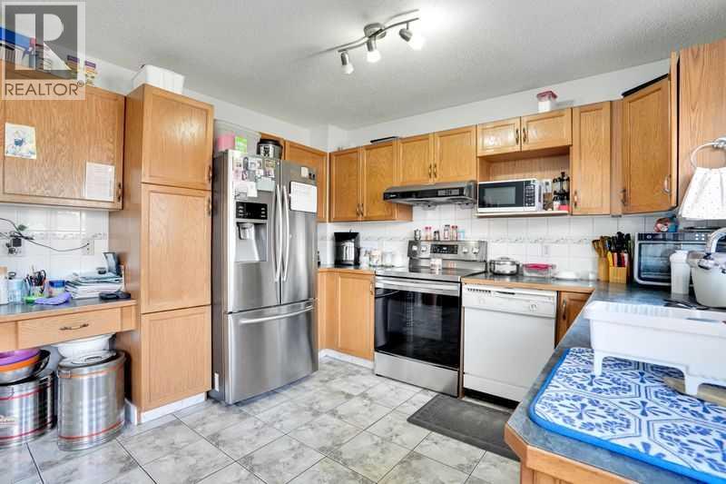 8 Martin Crossing Crescent Ne, Calgary, Alberta  T3J 3P3 - Photo 32 - A2257065