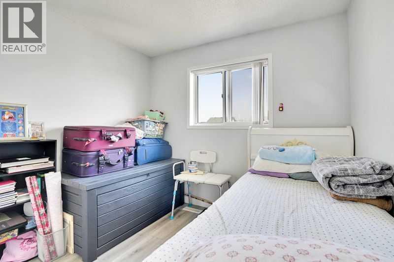 8 Martin Crossing Crescent Ne, Calgary, Alberta  T3J 3P3 - Photo 33 - A2257065