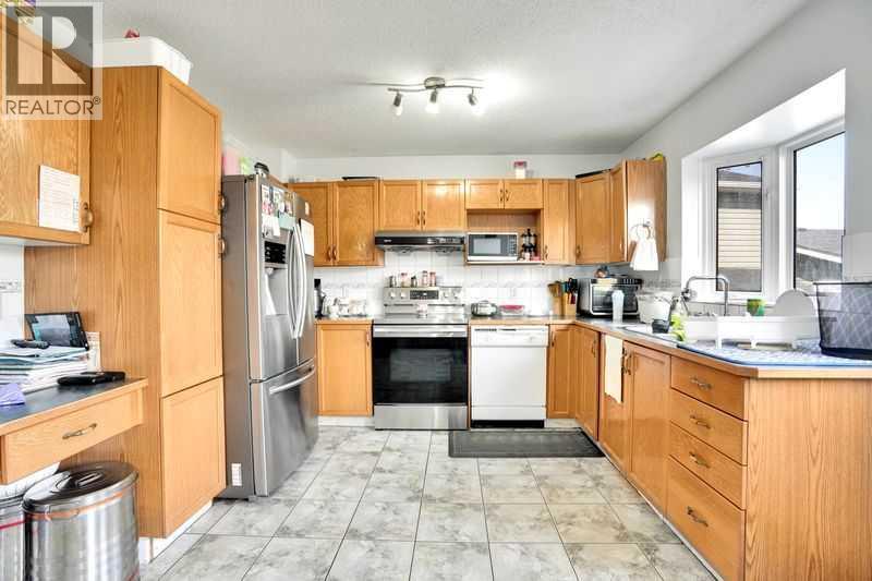 8 Martin Crossing Crescent Ne, Calgary, Alberta  T3J 3P3 - Photo 36 - A2257065