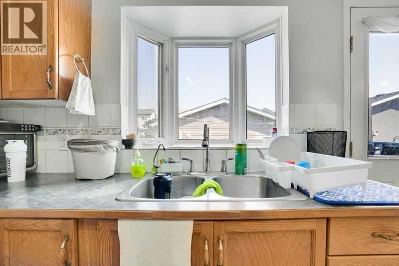 8 Martin Crossing Crescent Ne, Calgary, Alberta  T3J 3P3 - Photo 4 - A2257065