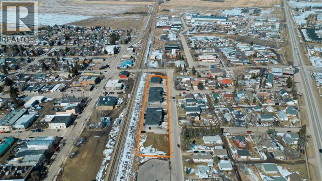 103, 201, 209 And 305 9 Avenue S, Carstairs, Alberta  T0M 0N0 - Photo 2 - A2185638