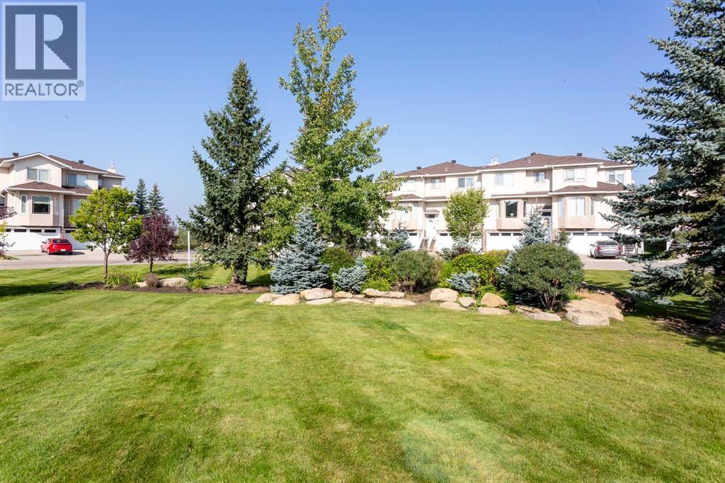 124 Country Hills Gardens Nw, Calgary, Alberta  T3K 5G6 - Photo 2 - A2254451
