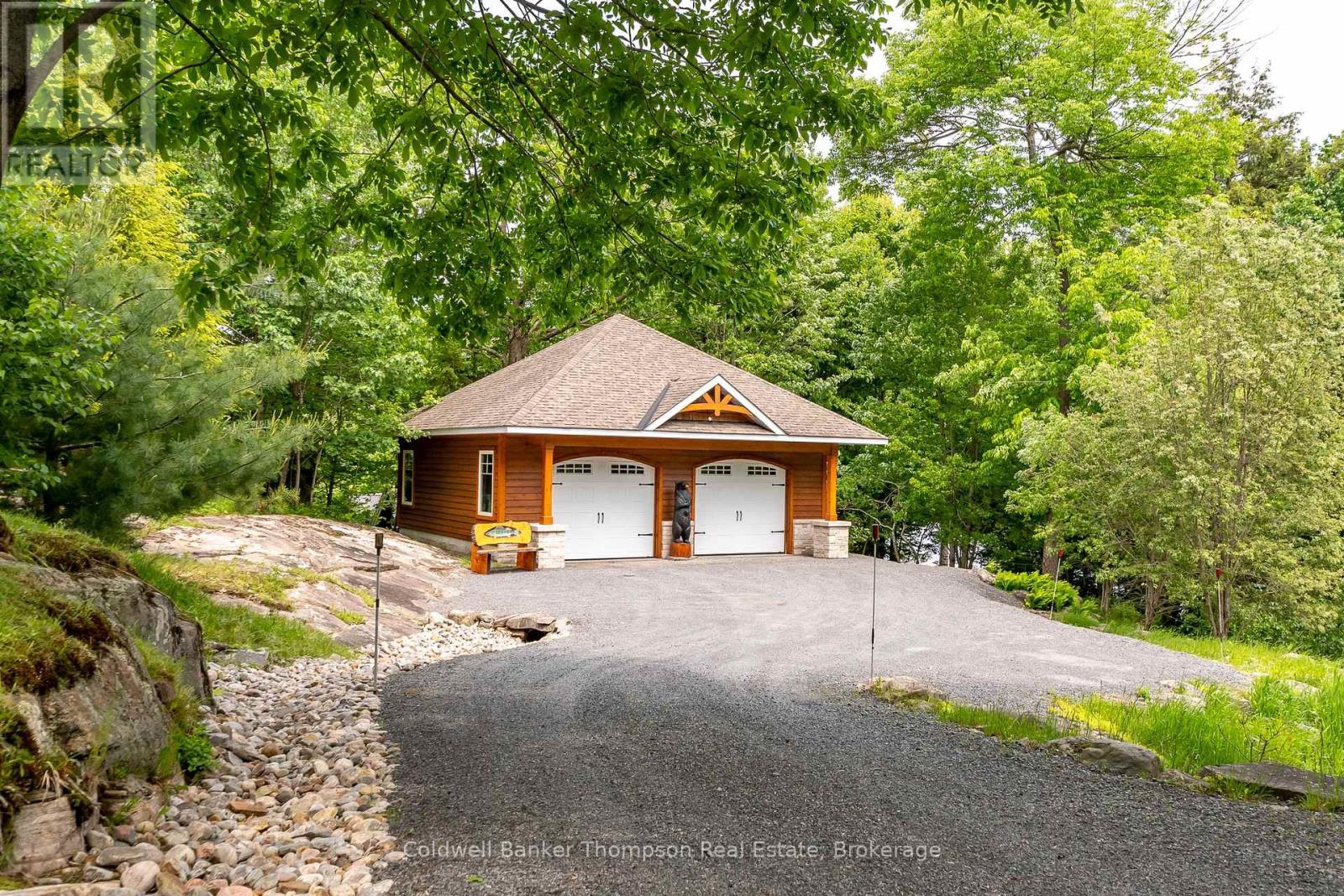 707 Evergreen Trail, Huntsville, Ontario  P1H 2L5 - Photo 46 - X12412918