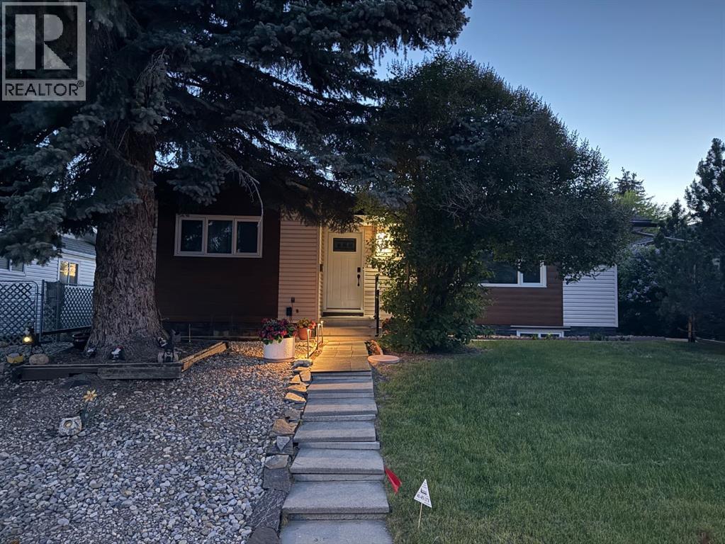 8031 Huntwick Hill Ne, Calgary, Alberta  T2K 4G9 - Photo 2 - A2219660