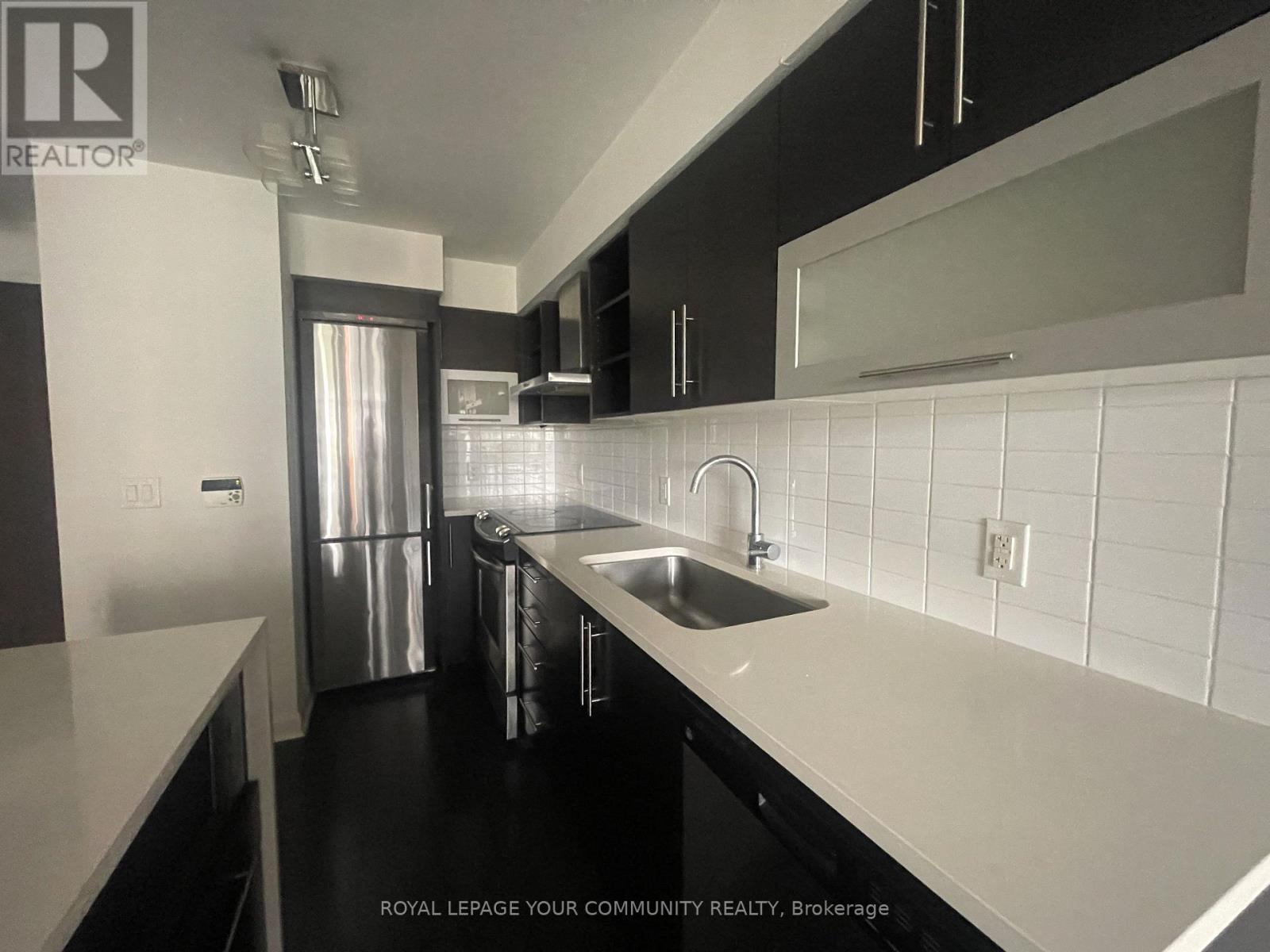 701 - 1 Michael Power Place, Toronto, Ontario  M9A 0A5 - Photo 4 - W12346992