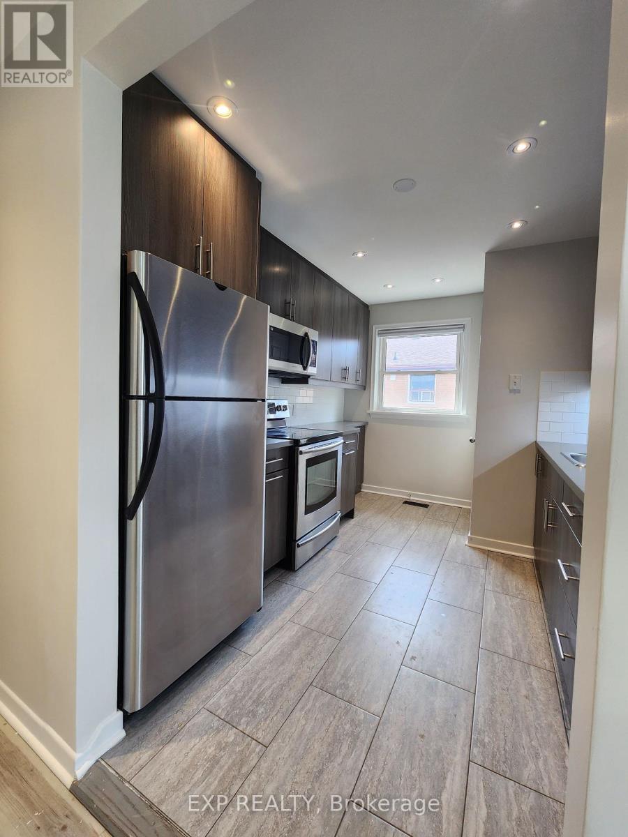1 - 98 Corby Crescent, Brampton, Ontario  L6Y 1H1 - Photo 6 - W12412973