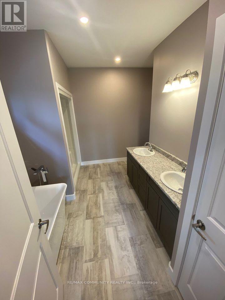 52 Potter Drive, Loyalist, Ontario  K0H 2H0 - Photo 17 - X12413186