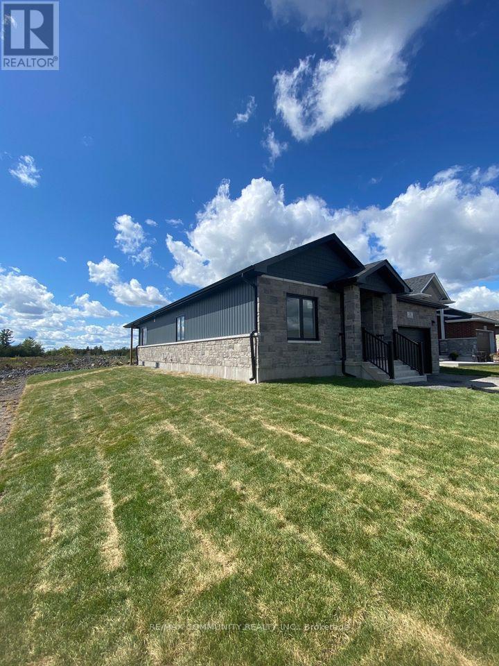 52 Potter Drive, Loyalist, Ontario  K0H 2H0 - Photo 2 - X12413186