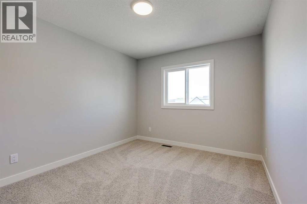 157 Wolf Hollow Drive Se, Calgary, Alberta  T2X 6C4 - Photo 5 - A2231568