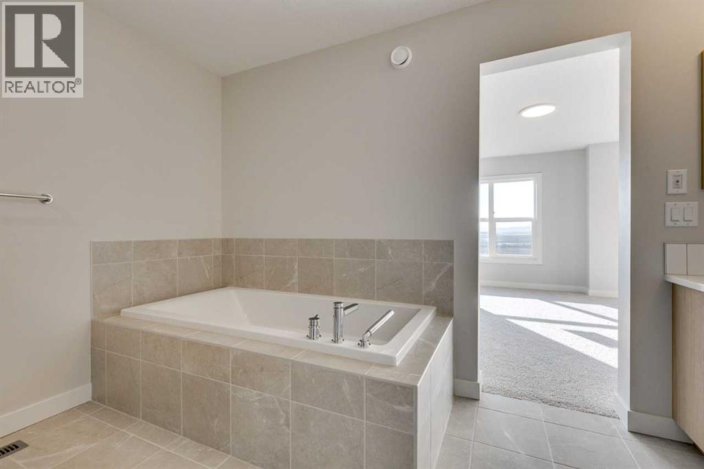 157 Wolf Hollow Drive Se, Calgary, Alberta  T2X 6C4 - Photo 12 - A2231568