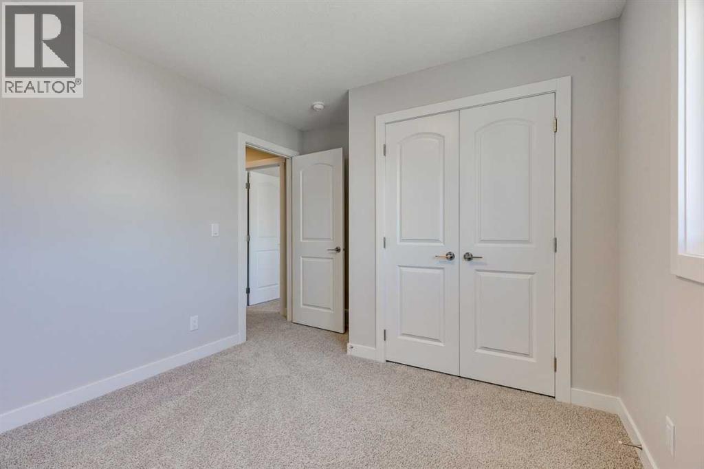 157 Wolf Hollow Drive Se, Calgary, Alberta  T2X 6C4 - Photo 6 - A2231568