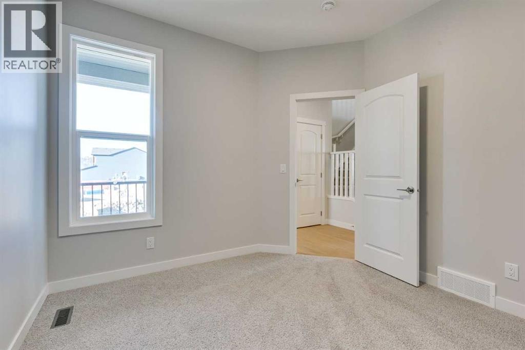 157 Wolf Hollow Drive Se, Calgary, Alberta  T2X 6C4 - Photo 35 - A2231568