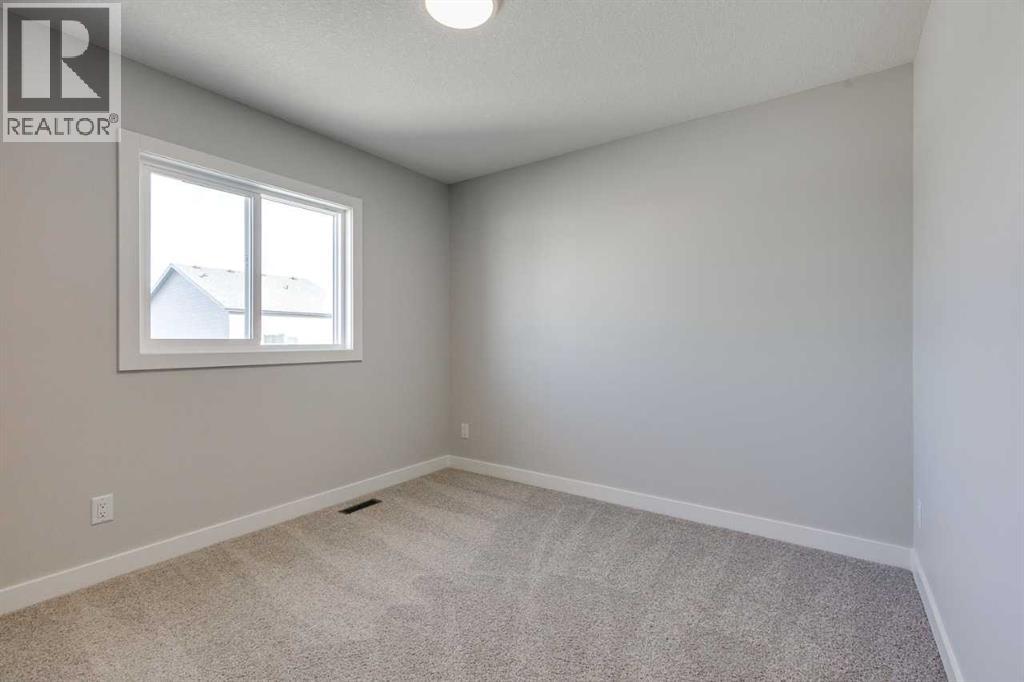157 Wolf Hollow Drive Se, Calgary, Alberta  T2X 6C4 - Photo 7 - A2231568