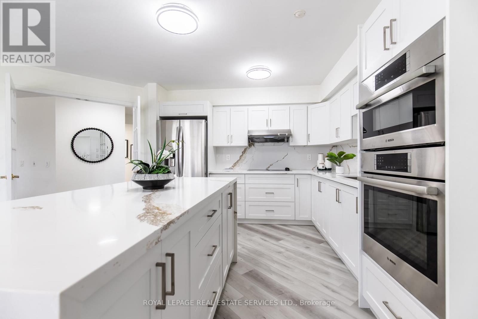 418 - 25 Kingsbridge Garden Circle, Mississauga, Ontario  L5R 4B1 - Photo 13 - W12413385