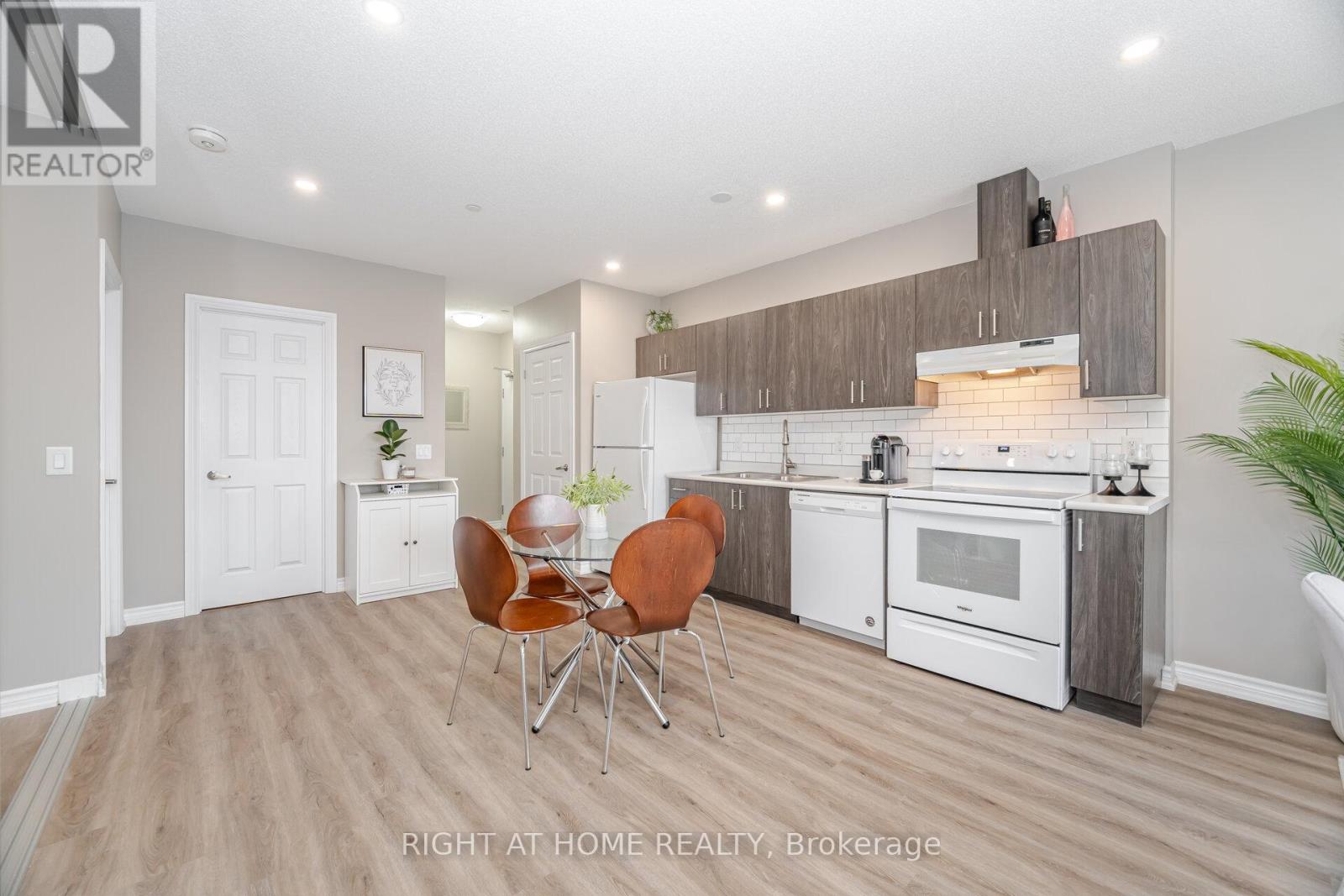 101 - 716 Main Street E, Milton, Ontario  L9T 3P6 - Photo 3 - W12413441