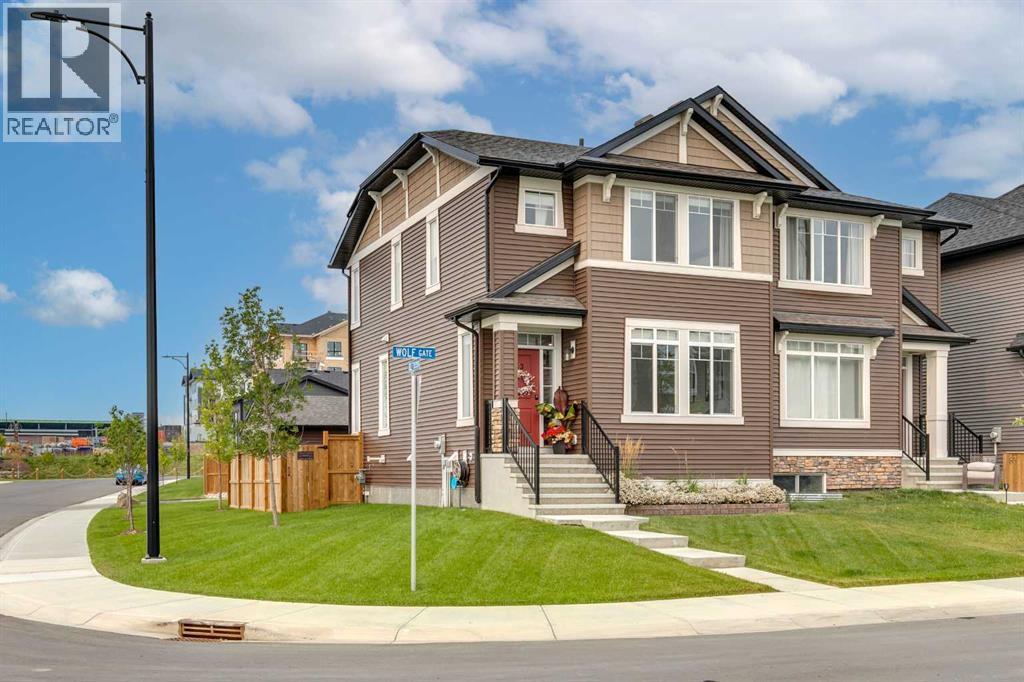 63 Wolf Gate, Okotoks, Alberta  T1S 5T9 - Photo 1 - A2255196