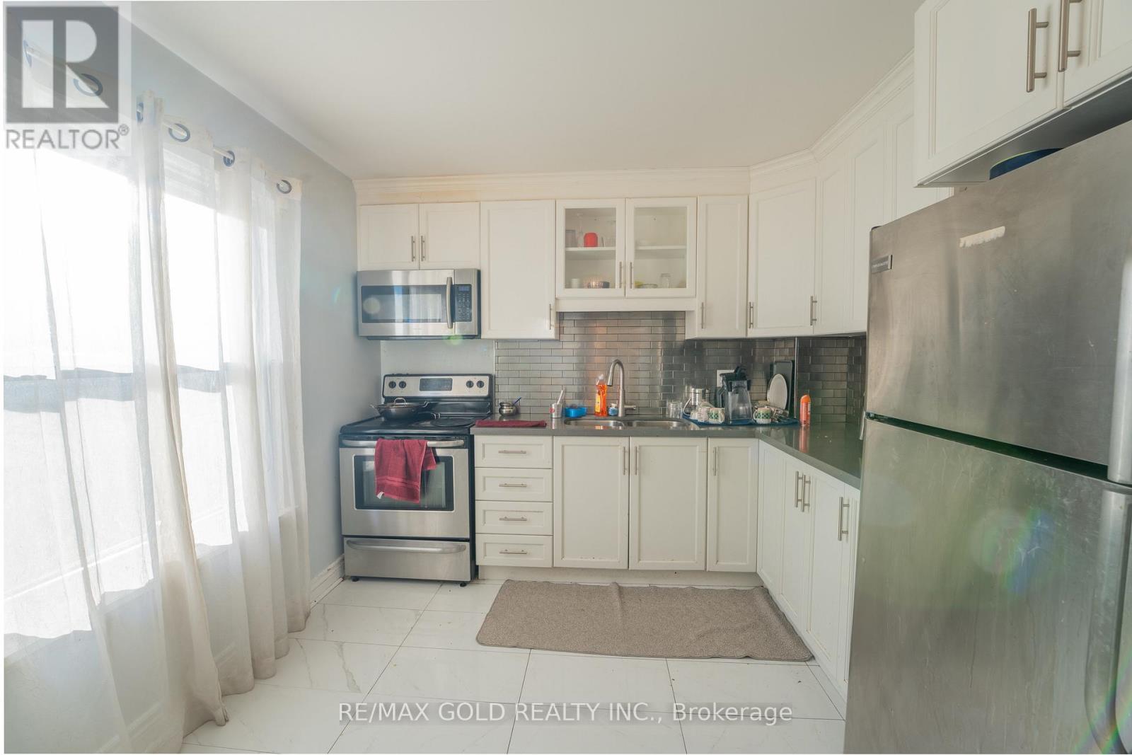 107 - 900 Central Park Drive, Brampton, Ontario  L6S 3J6 - Photo 8 - W12413499