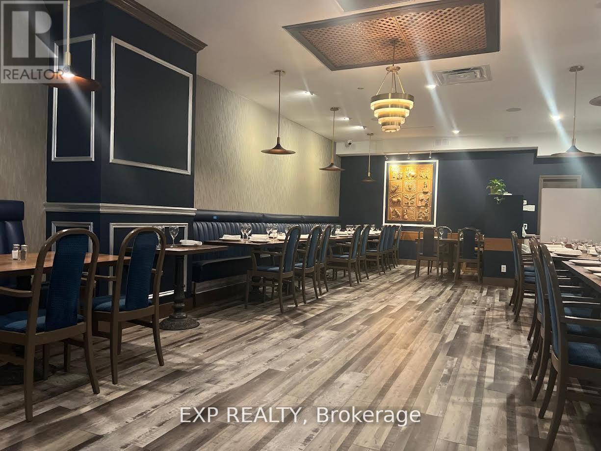 148 Queen Street E, Brampton, Ontario  L6V 1B2 - Photo 4 - W12413507