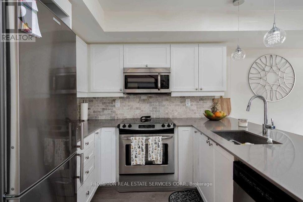 3 - 167 William Duncan Road, Toronto, Ontario  M3K 0B7 - Photo 4 - W12413630