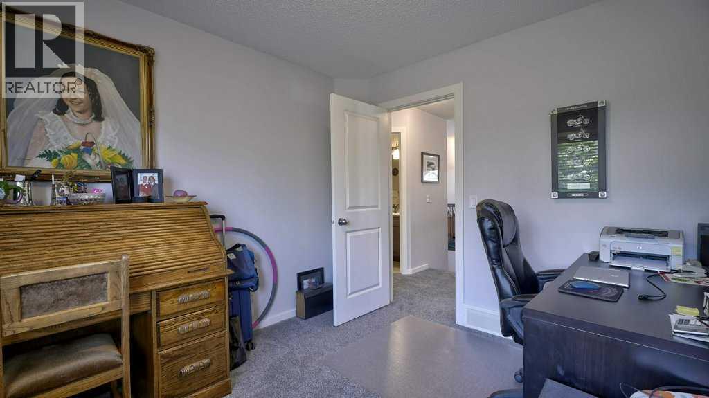 244 Heritage Bay, Cochrane, Alberta  T4C 0L3 - Photo 30 - A2235147