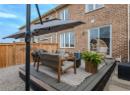 Wooden terrace with an outdoor living space and a gazebo