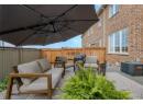 Fenced backyard featuring outdoor lounge area and a wooden deck