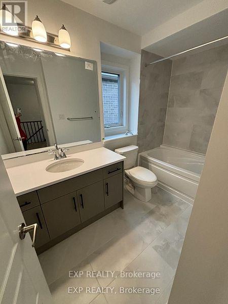 128 Marigold Gardens, Oakville, Ontario  L6H 7X7 - Photo 7 - W12414036