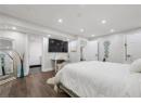Bedroom featuring dark wood-type flooring and recessed lighting