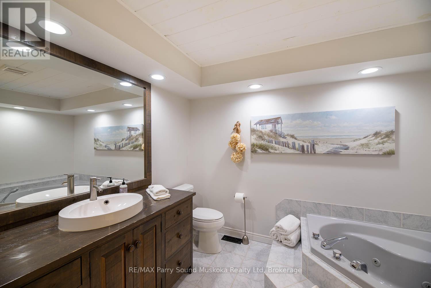 1075 Sawmill Lane, Lake Of Bays (Sinclair), Ontario  P1H 2J6 - Photo 14 - X12414215