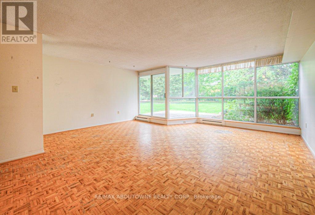 103 - 1071 Queens Avenue, Oakville, Ontario  L6H 2R5 - Photo 6 - W12414242