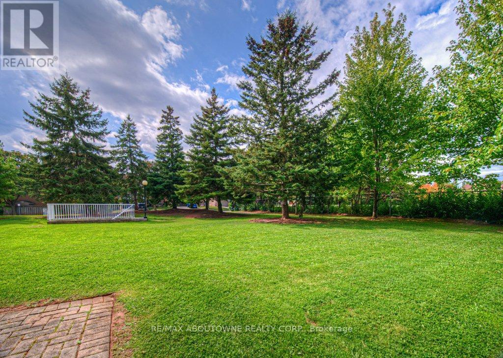 103 - 1071 Queens Avenue, Oakville, Ontario  L6H 2R5 - Photo 7 - W12414242