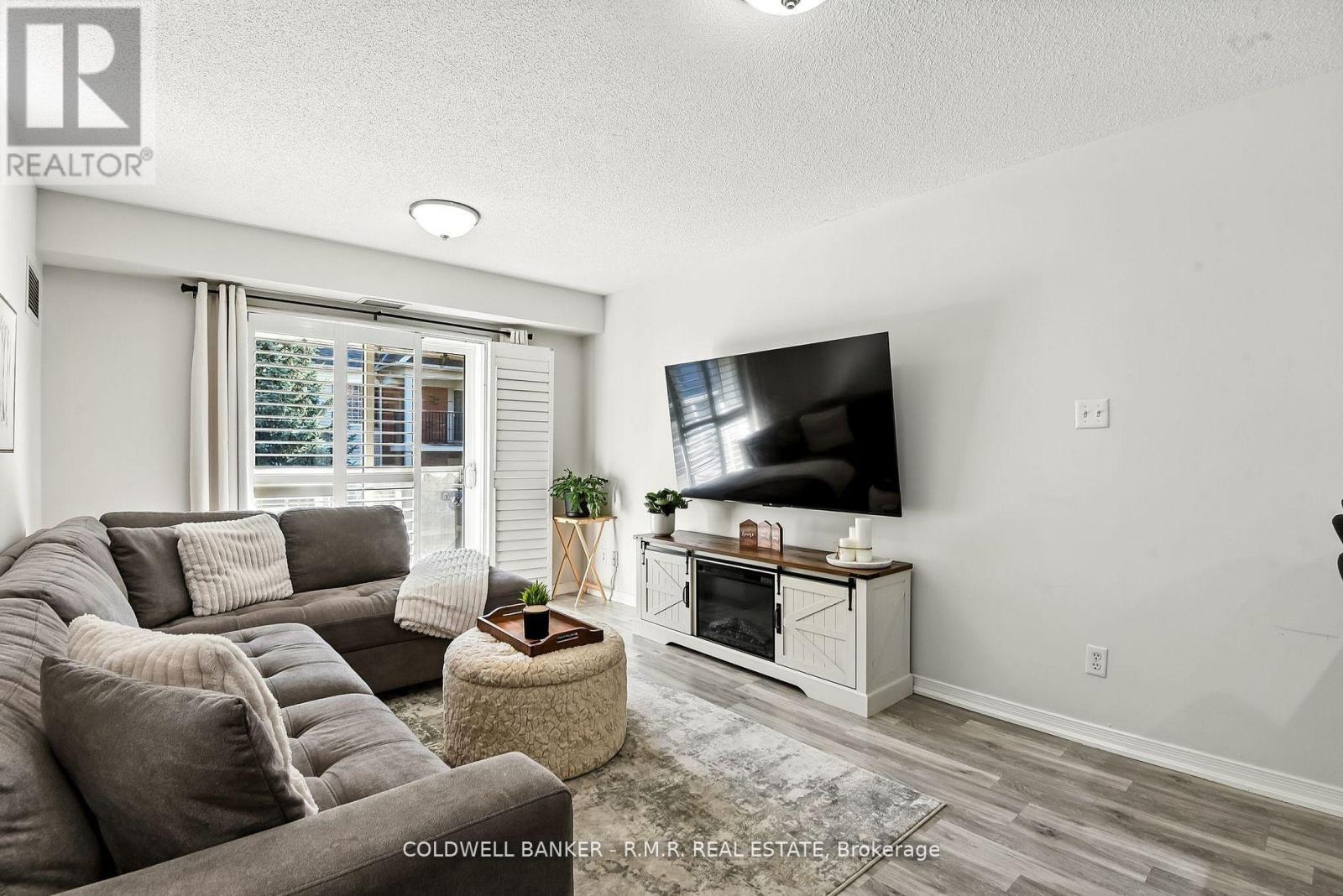 310 - 124 Aspen Springs Drive, Clarington, Ontario  L1C 0G8 - Photo 3 - E12414362