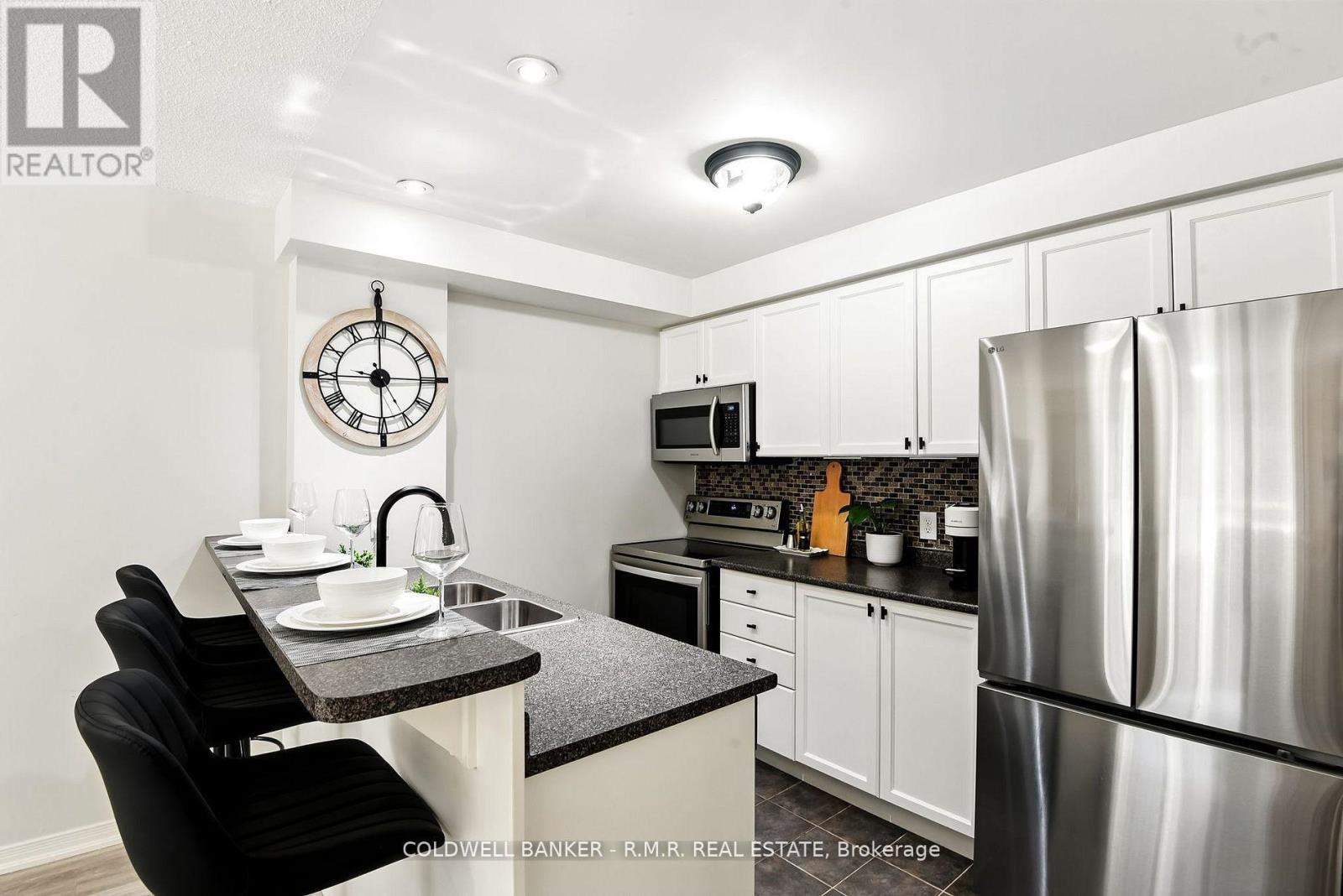 310 - 124 Aspen Springs Drive, Clarington, Ontario  L1C 0G8 - Photo 8 - E12414362