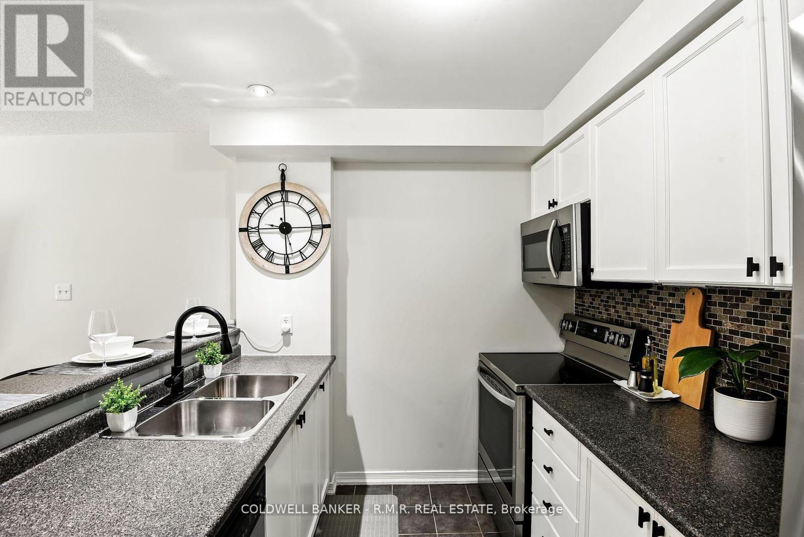 310 - 124 Aspen Springs Drive, Clarington, Ontario  L1C 0G8 - Photo 9 - E12414362