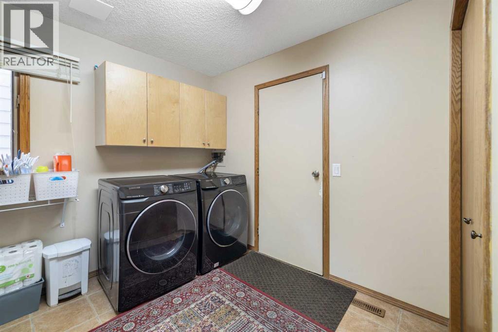 156 Woodfield Road Sw, Calgary, Alberta  T2X 3V9 - Photo 9 - A2246103