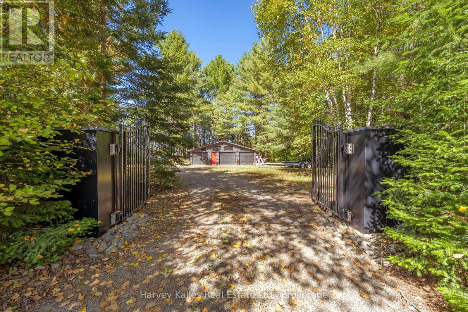 1003 Hollow Road, Algonquin Highlands, Ontario  P0A 1E0 - Photo 2 - X12414484