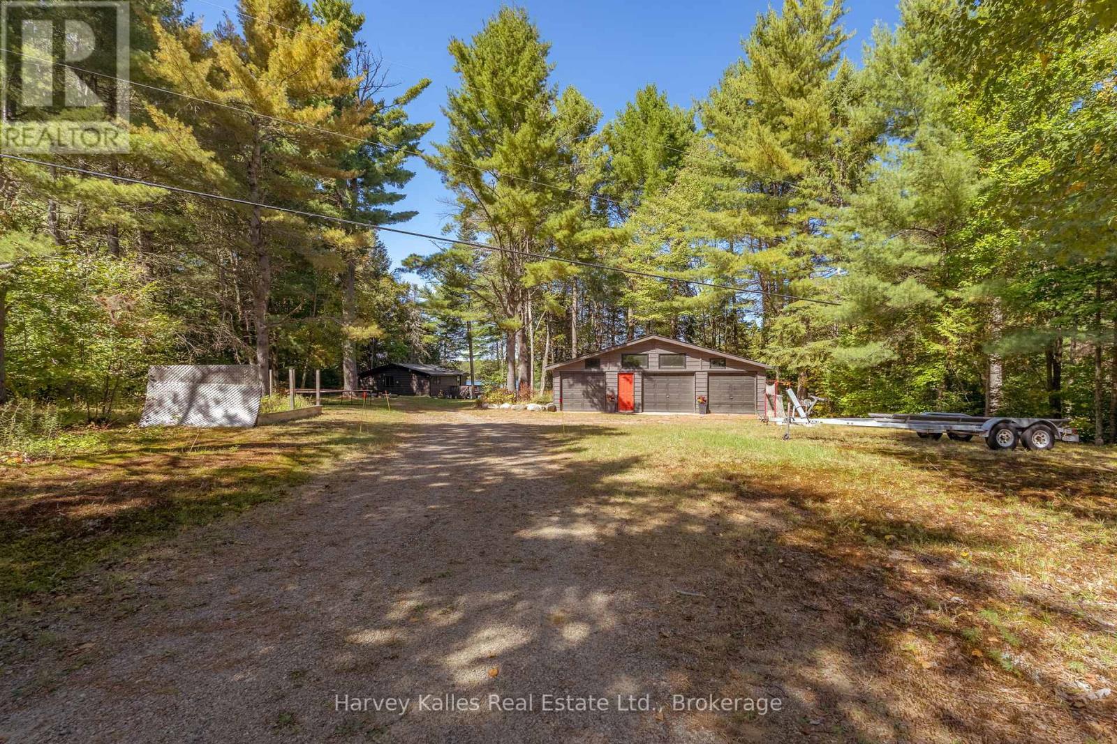 1003 Hollow Road, Algonquin Highlands, Ontario  P0A 1E0 - Photo 3 - X12414484