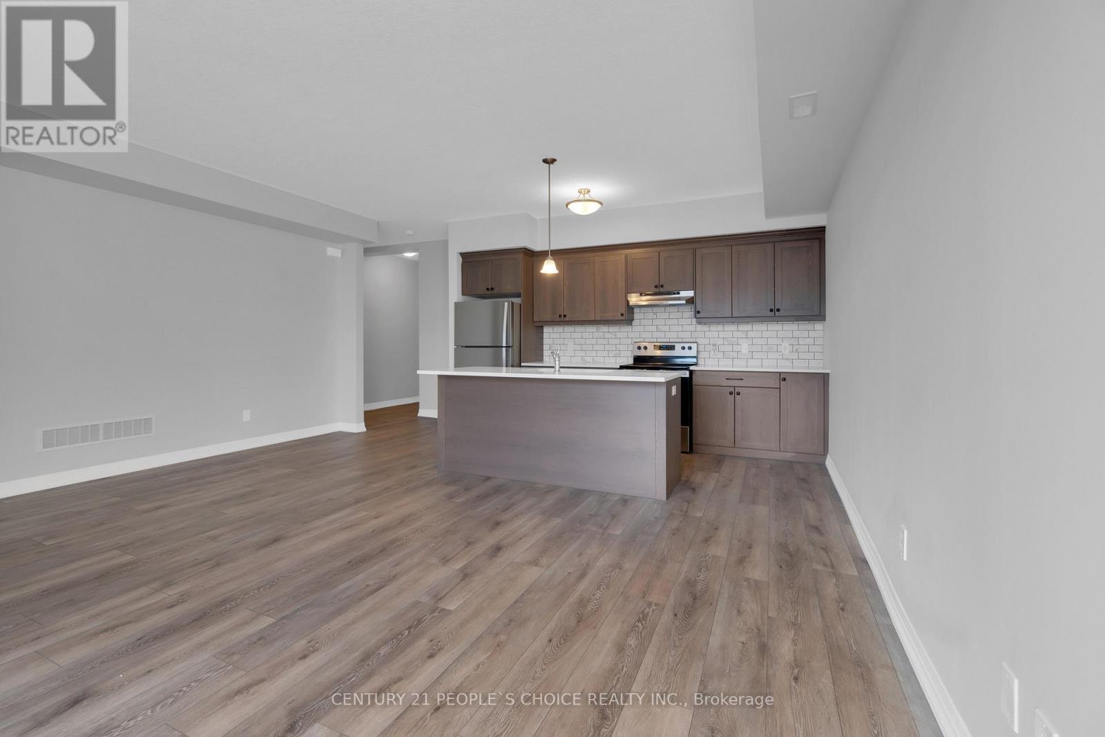 76 - 261 Woodbine Avenue, Kitchener, Ontario  N2R 0S7 - Photo 4 - X12414562