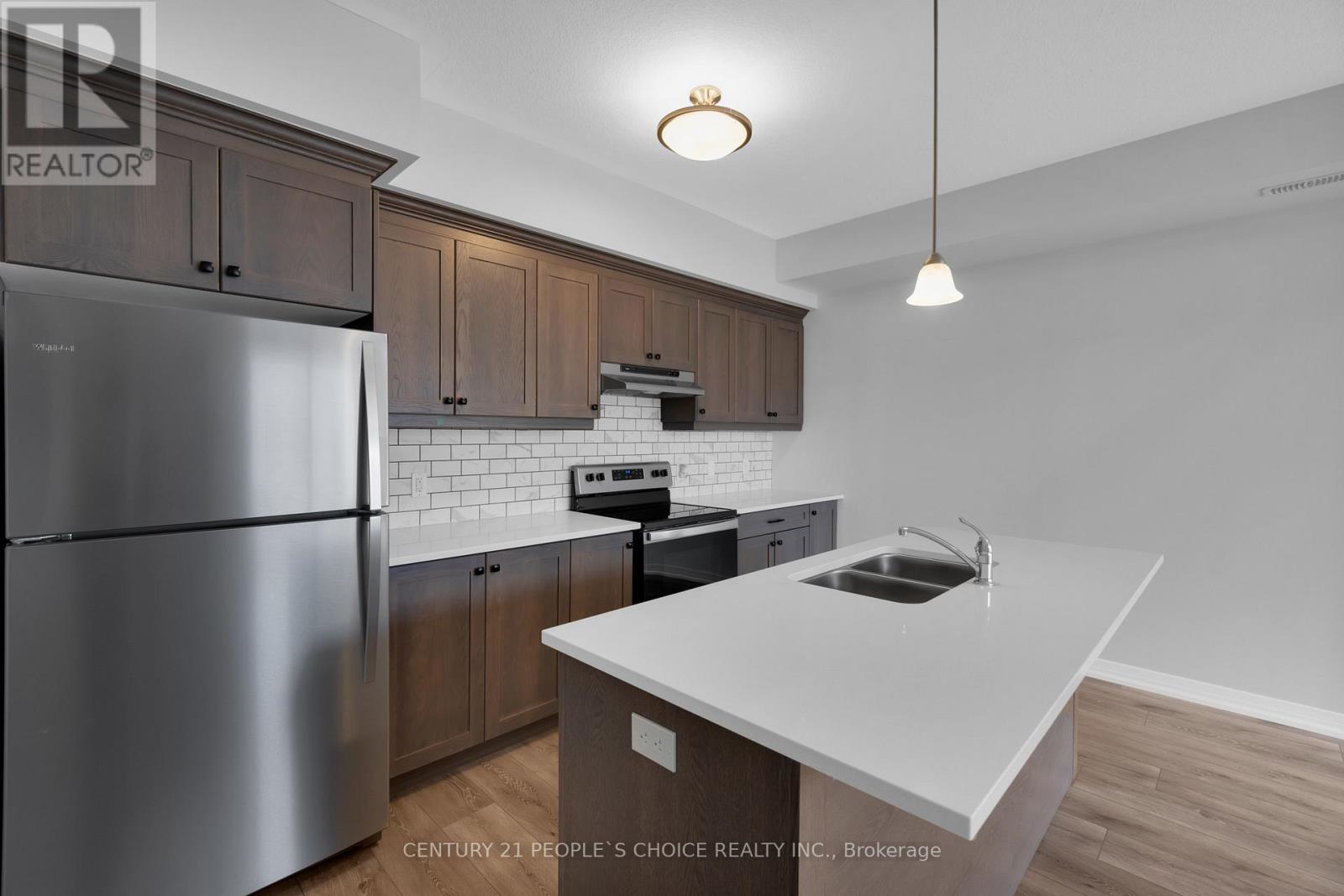 76 - 261 Woodbine Avenue, Kitchener, Ontario  N2R 0S7 - Photo 7 - X12414562