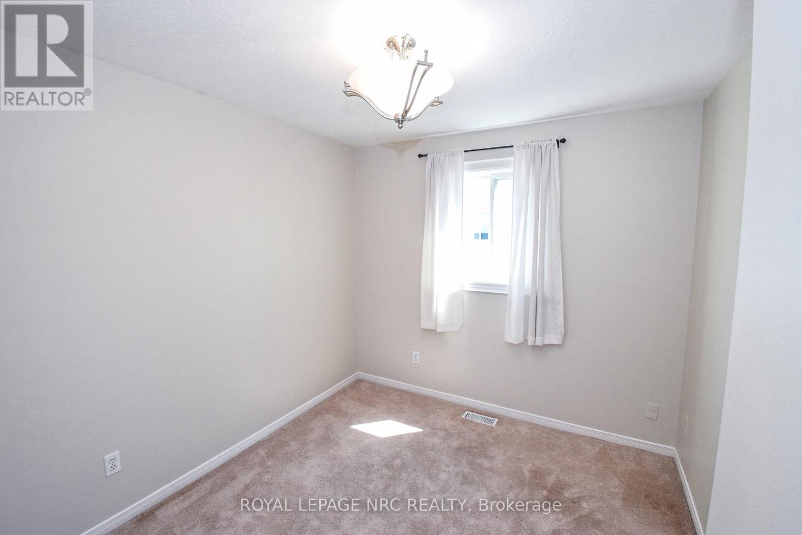 4974 Windgate Drive E, Niagara Falls, Ontario  L2H 2Z7 - Photo 23 - X12414835