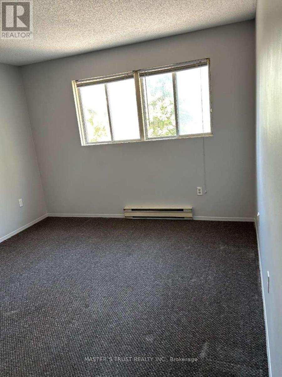 201 - 837 Simcoe Street S, Oshawa, Ontario  L1H 4K8 - Photo 3 - E12414721