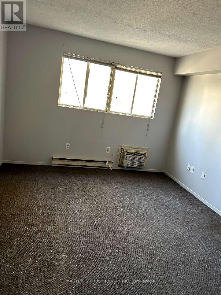 201 - 837 Simcoe Street S, Oshawa, Ontario  L1H 4K8 - Photo 4 - E12414721