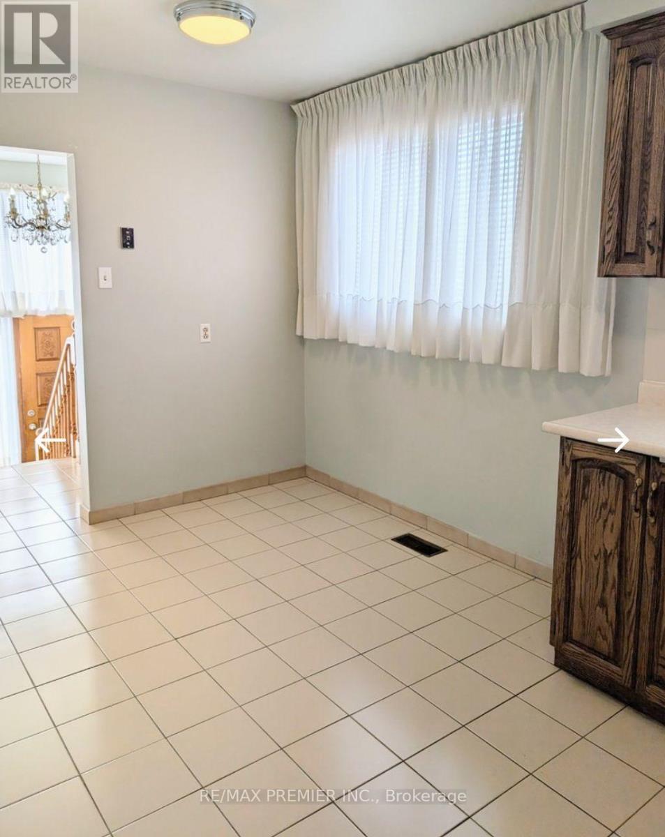 Main Floor - 71 Sorlyn Avenue, Toronto, Ontario  M6L 1H7 - Photo 4 - W12414844