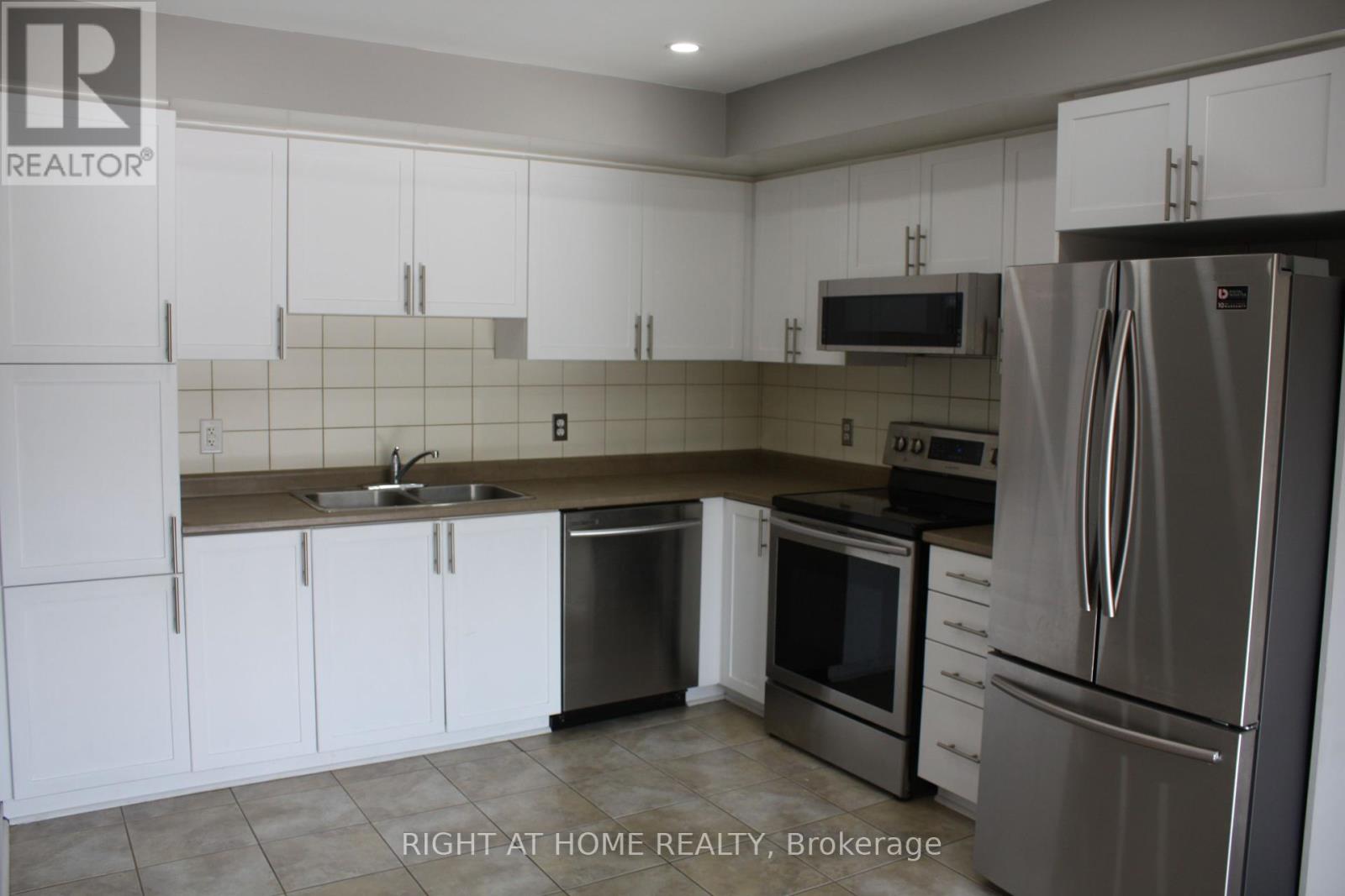 123 - 2891 Rio Court, Mississauga (Central Erin Mills), Ontario  L5M 0S3 - Photo 6 - W12414913